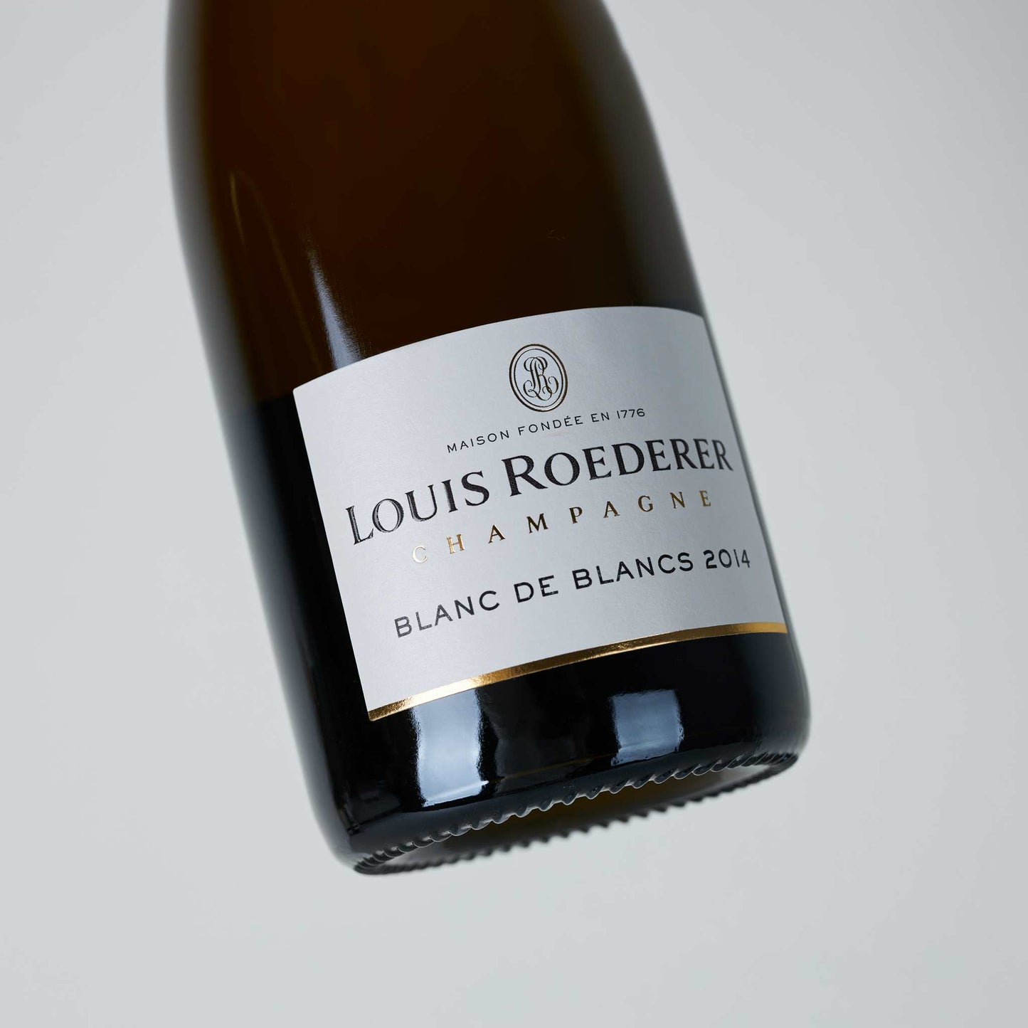 Champagnerflasche, weißes Etikett mit Aufschrift: "Louis Roederer Blancs de Blancs 2014"